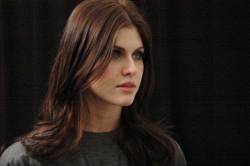 woman with brown hair and blue eyes