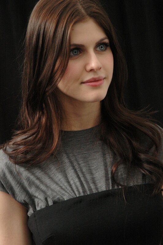 woman with brown hair and blue eyes