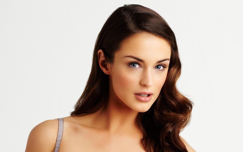woman with brown hair and blue eyes