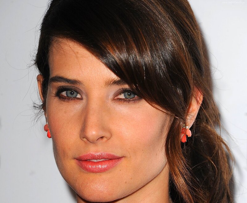 woman with brown hair and blue eyes