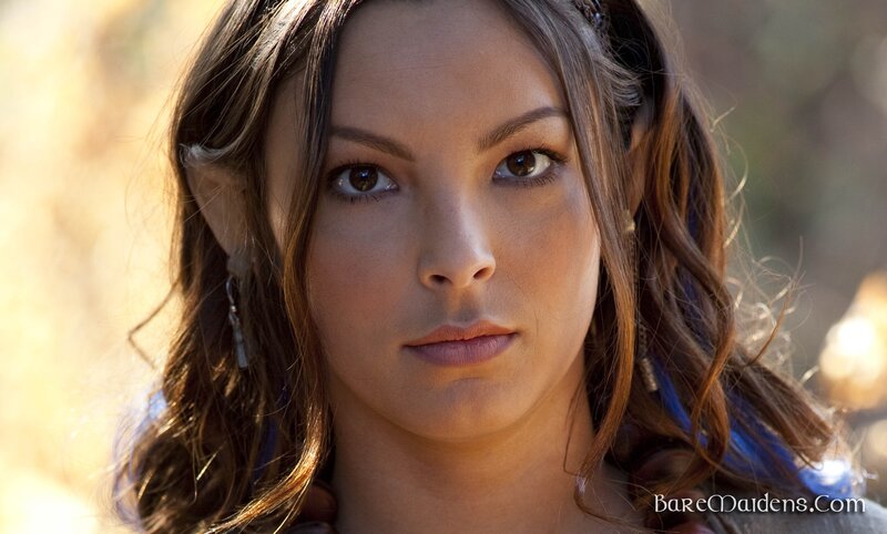 woman with brown hair and blue streaks