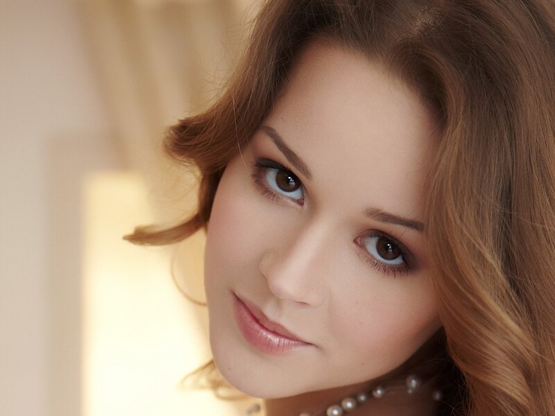 woman with brown hair and eyes