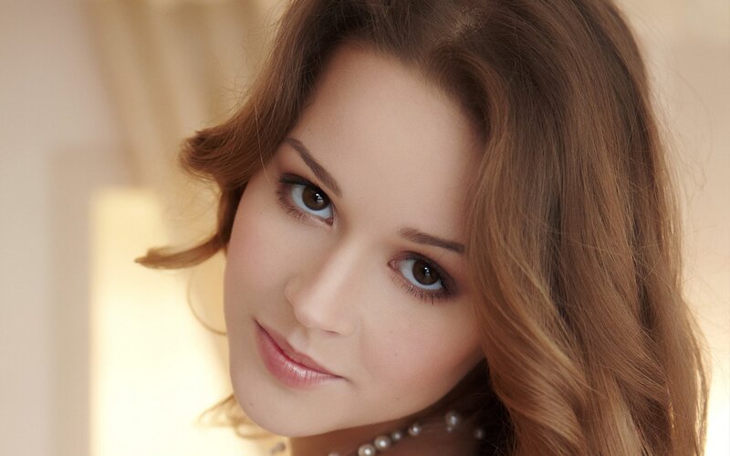 woman with brown hair and eyes