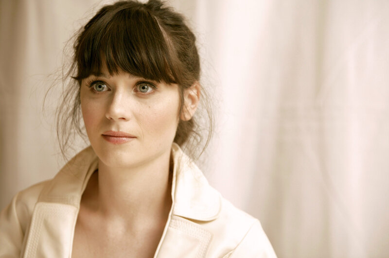 woman with brown hair and green eyes