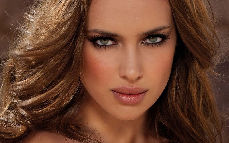 woman with brown hair and green eyes