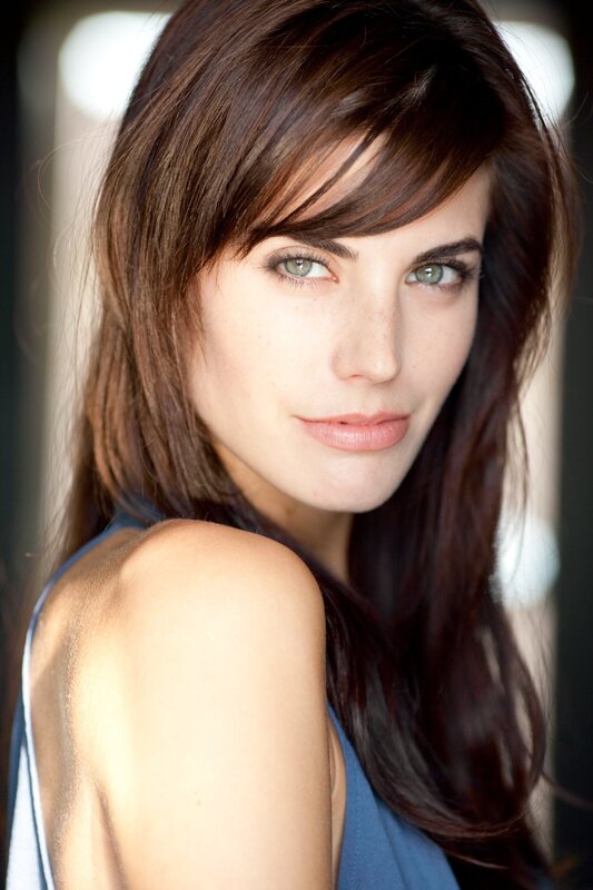 woman with brown hair and green eyes