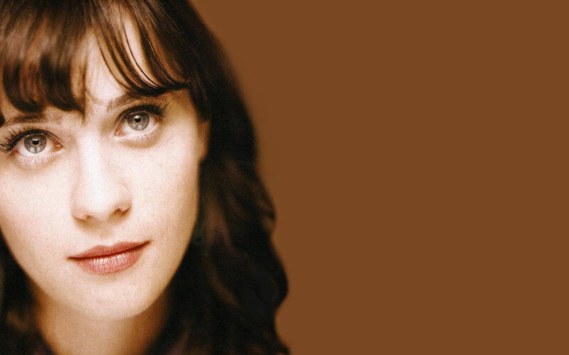woman with brown hair and green eyes