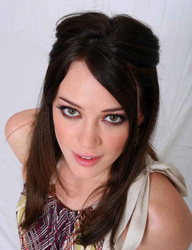 woman with brown hair and green eyes