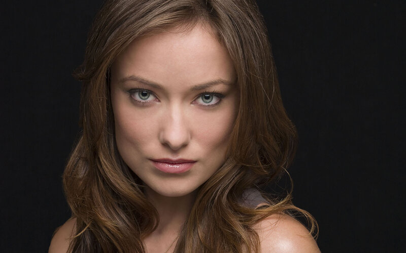 woman with brown hair and green eyes