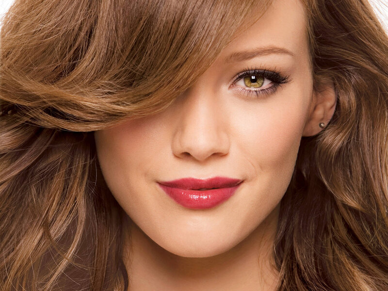 woman with brown hair and green eyes