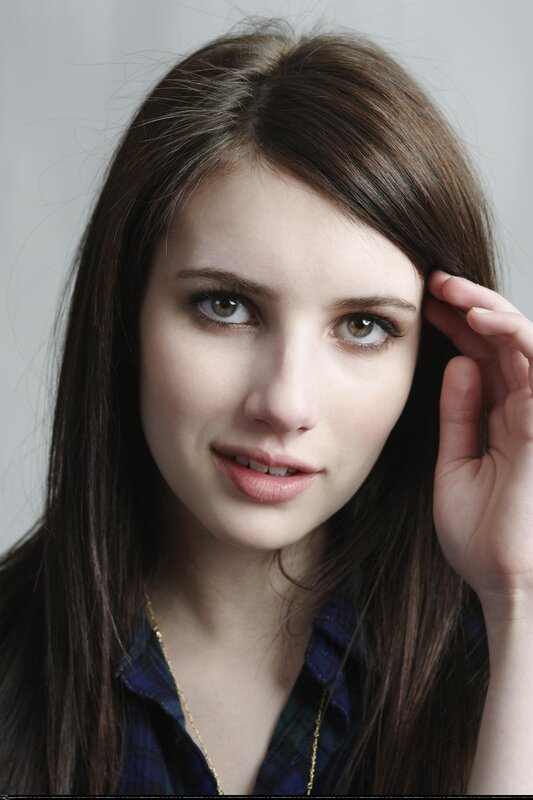 woman with brown hair and green eyes