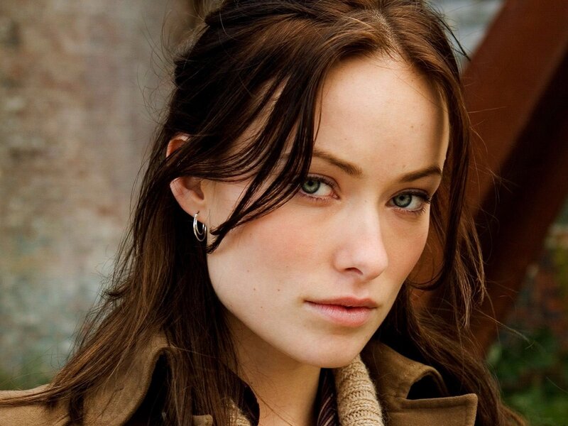 woman with brown hair and green eyes