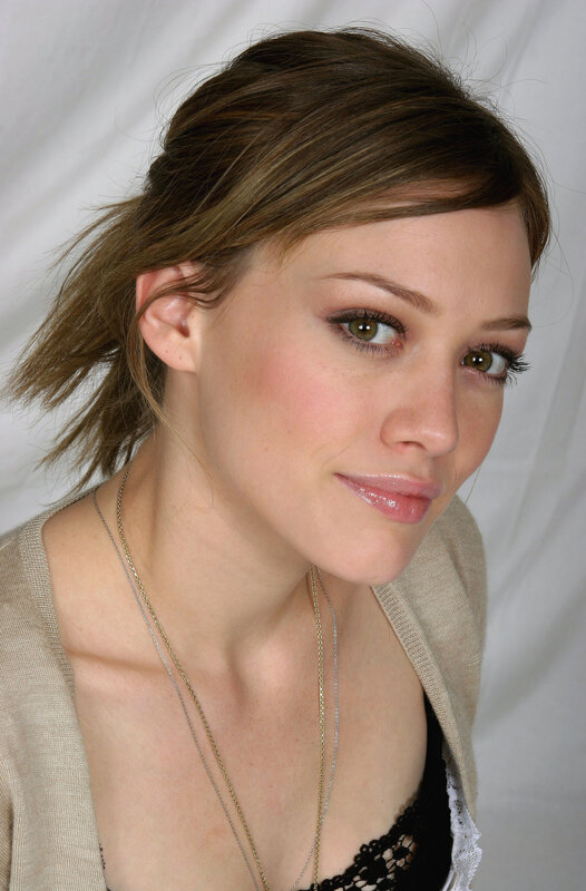 woman with brown hair and green eyes