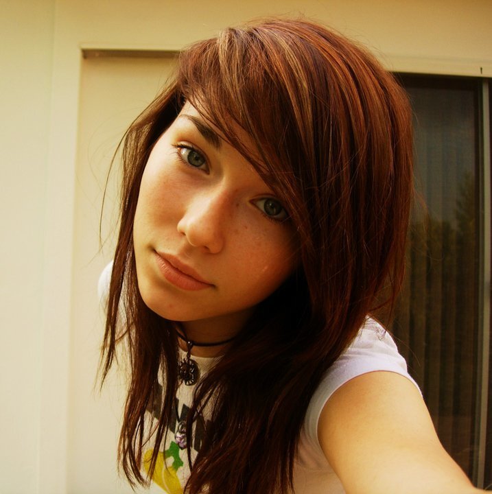 woman with brown hair and green eyes