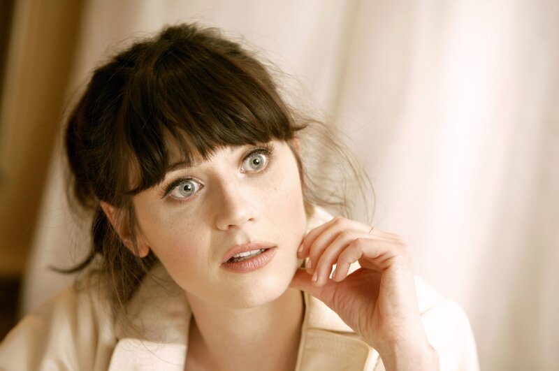 woman with brown hair and green eyes