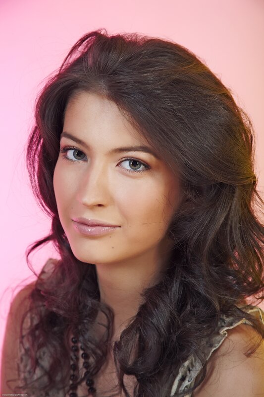 woman with brown hair and green eyes
