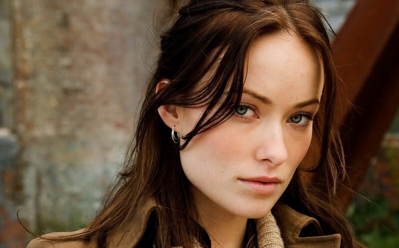 woman with brown hair and green eyes