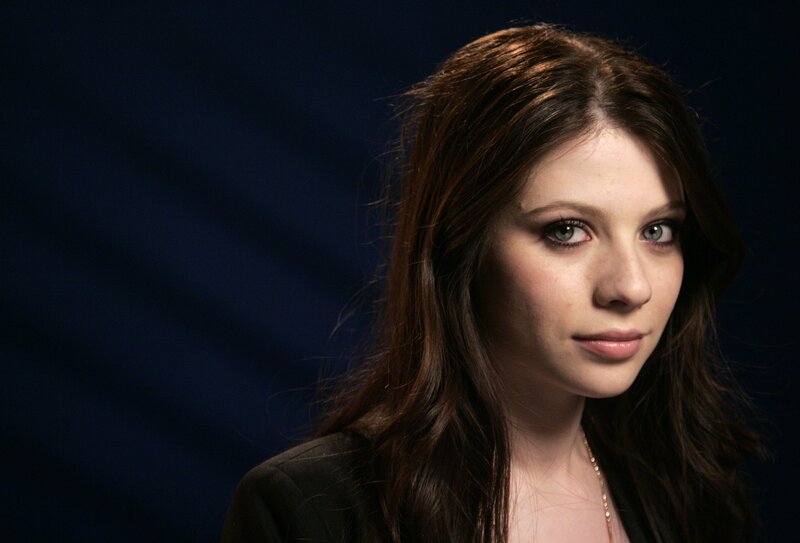 woman with brown hair and green eyes