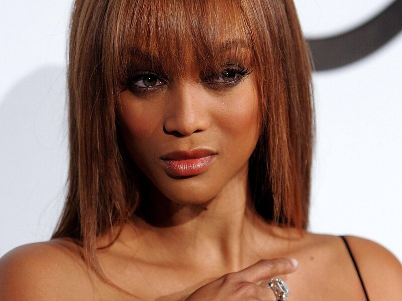 woman with brown hair and makeup
