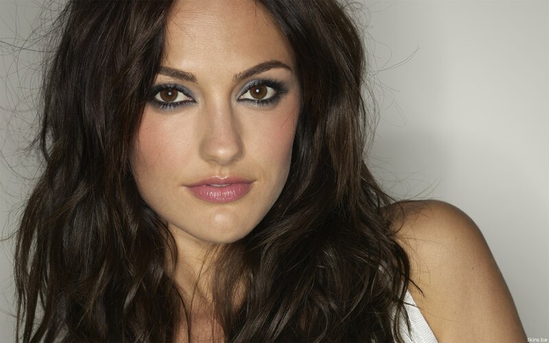 woman with brown hair and makeup
