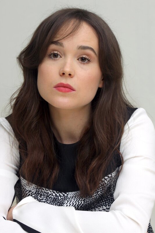 woman with brown hair and red lipstick