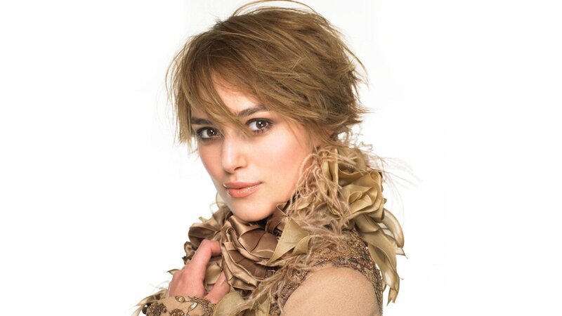 woman with brown hair and scarf