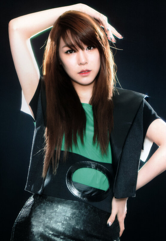 Woman with Brown Hair — Black, Dramatic, Photograph, Green Shirt
