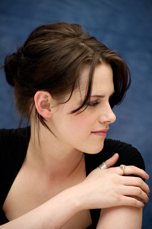 Woman with Brown Hair — Blue, Contemplative, Photograph, Black Top