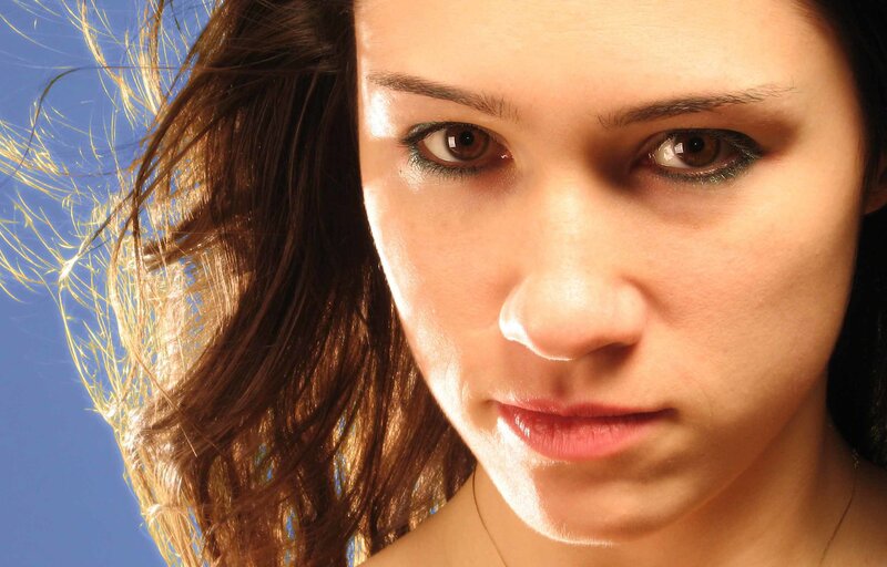 Woman with Brown Hair — Blue, Intense, Photograph