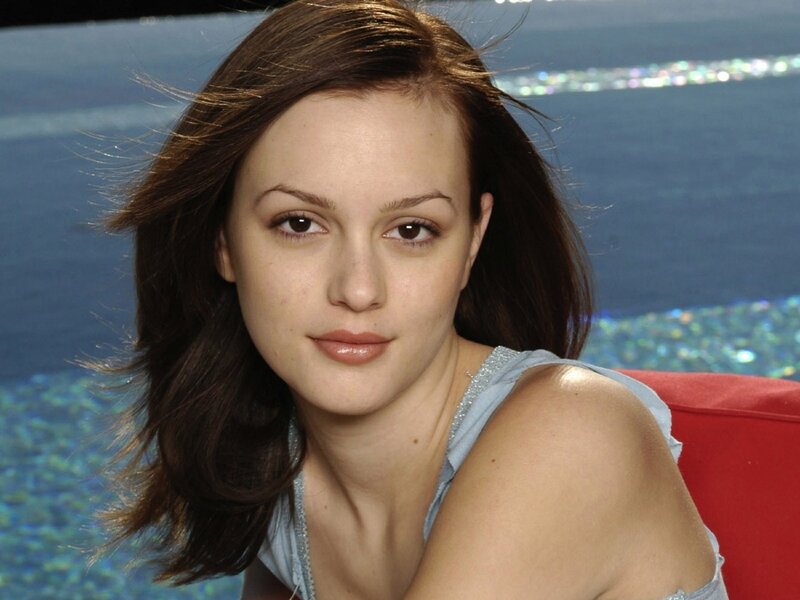 woman with brown hair by pool
