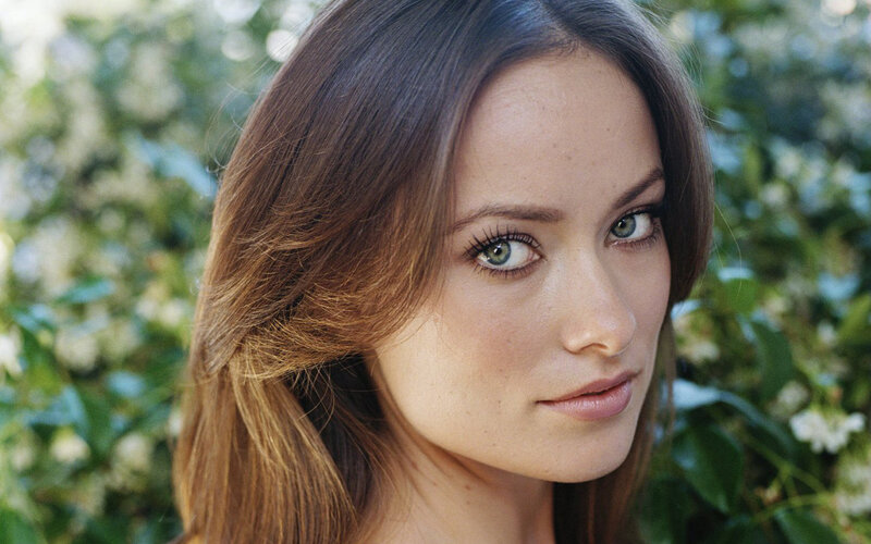 Woman with Brown Hair — Calm, Afternoon, Photograph, Green Eyes, White Flowers