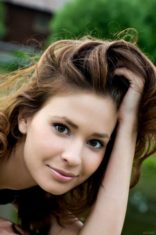 Woman with Brown Hair — Calm, Afternoon, Photograph, Hand, Green Background