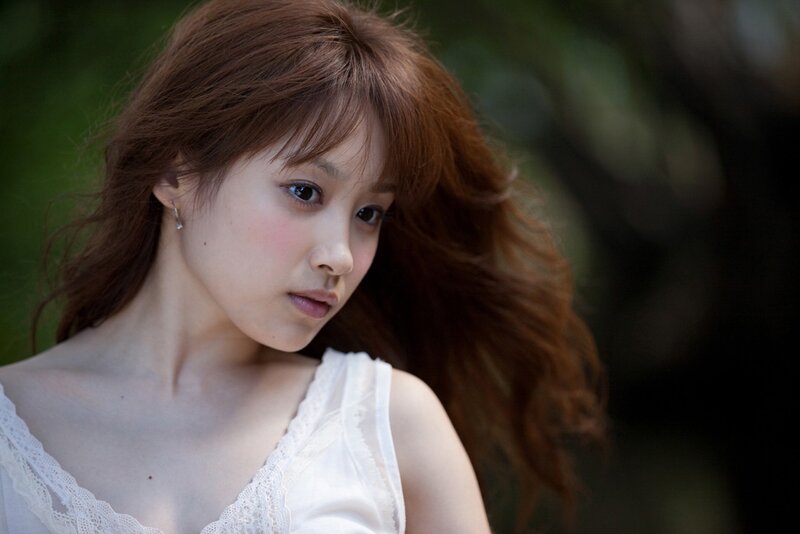 Woman with Brown Hair — Calm, Afternoon, Photograph, White Top, Earring