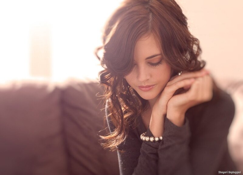 Woman with Brown Hair — Contemplative, Photograph, Couch