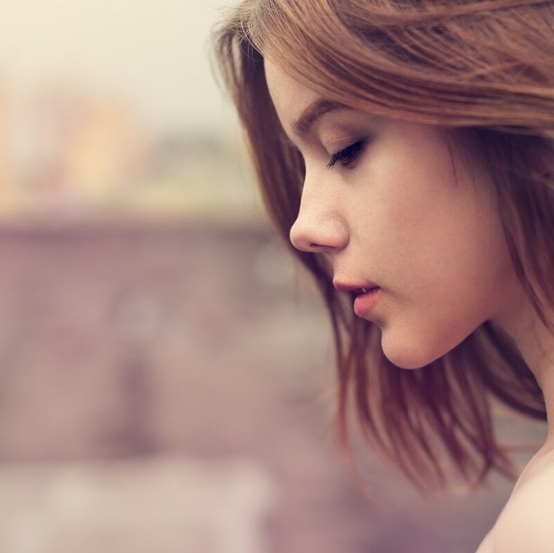 Woman with Brown Hair — Contemplative, Photograph, Profile