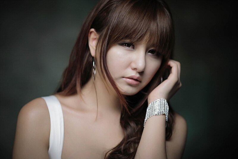 Woman with Brown Hair — Dramatic, Photograph, Earring, Bracelet