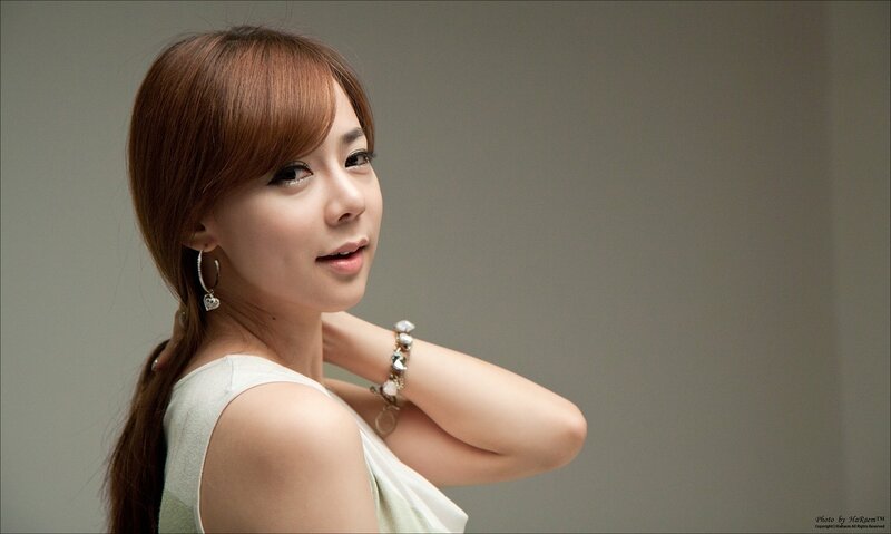 Woman with Brown Hair — Gray, Neutral, Photograph, Earring, Bracelet, White Top