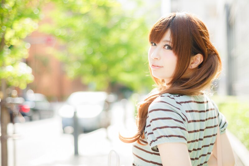 Woman with Brown Hair — Green, Serene, Afternoon, Photograph, Striped Shirt, Trees, Car