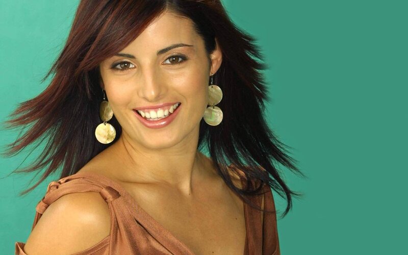 Woman with Brown Hair — Green, Smiling, Photograph, Earrings, Dress