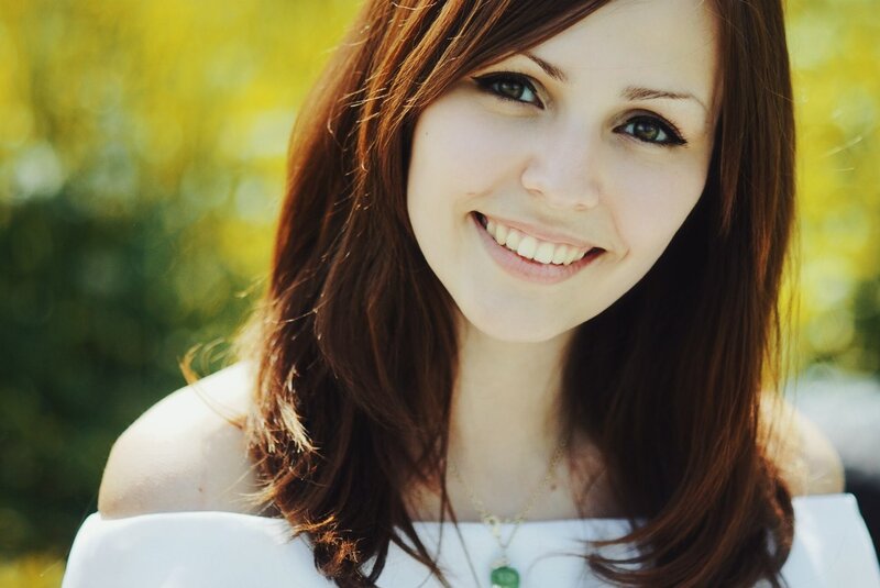 Woman with Brown Hair — Happy, Afternoon, Photograph, White Top, Necklace
