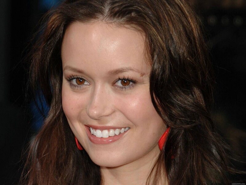 Woman with Brown Hair — Happy, Photograph, Red Earrings