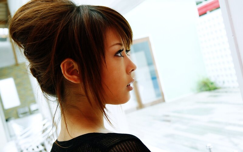 woman with brown hair in a bun