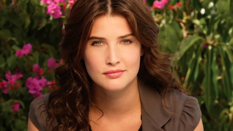 woman with brown hair in garden
