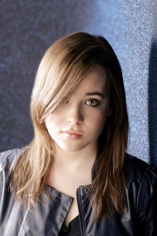 woman with brown hair in jacket