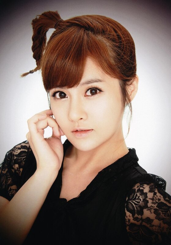 woman with brown hair in pigtails