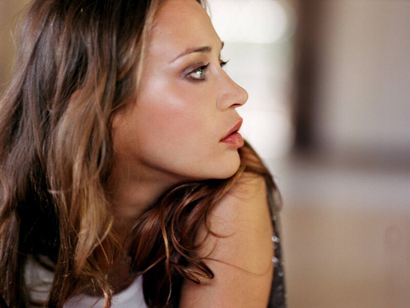 woman with brown hair in profile