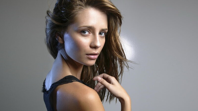 woman with brown hair in studio