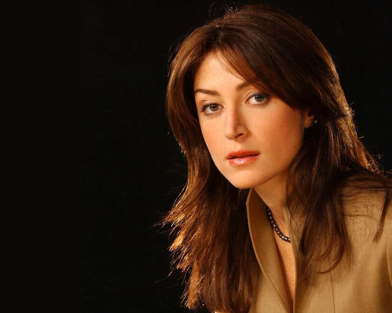 woman with brown hair in studio