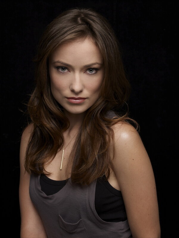 woman with brown hair in studio