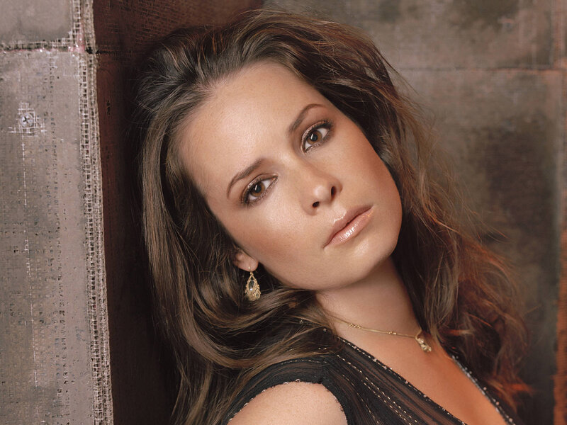 woman with brown hair leaning